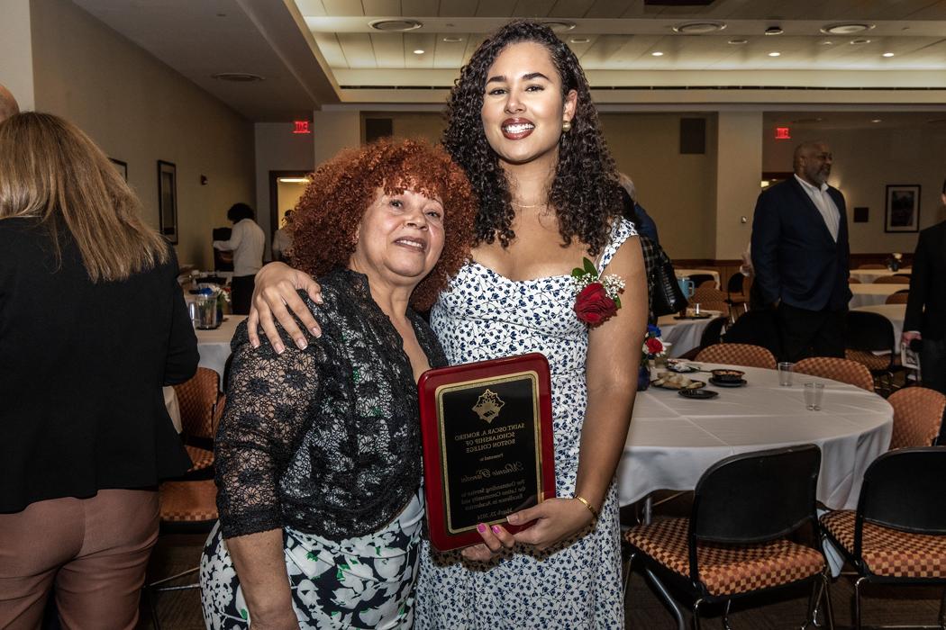 32nd annual Saint Oscar A. Romero Scholarship award ceremony and dinner.
This year's winner was Melanie Paredes '25 (MCAS), and the recipient of the Rev. John A. Dinneen Hispanic Alumni Community Service award was Migdalia Nalls, MCAS '01, Law '04.